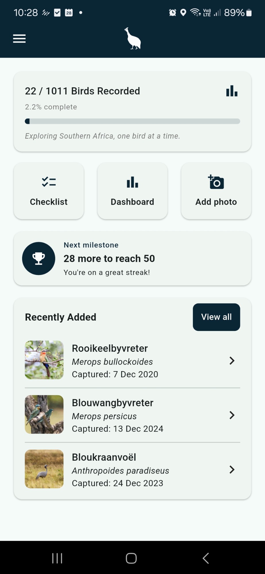 Home screen showing 22 of 1,011 birds recorded, with Checklist, Dashboard and Add photo buttons